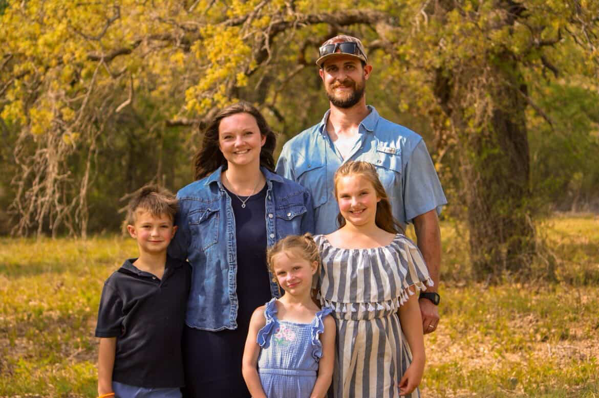 Family of five portrait in warm West Texas light