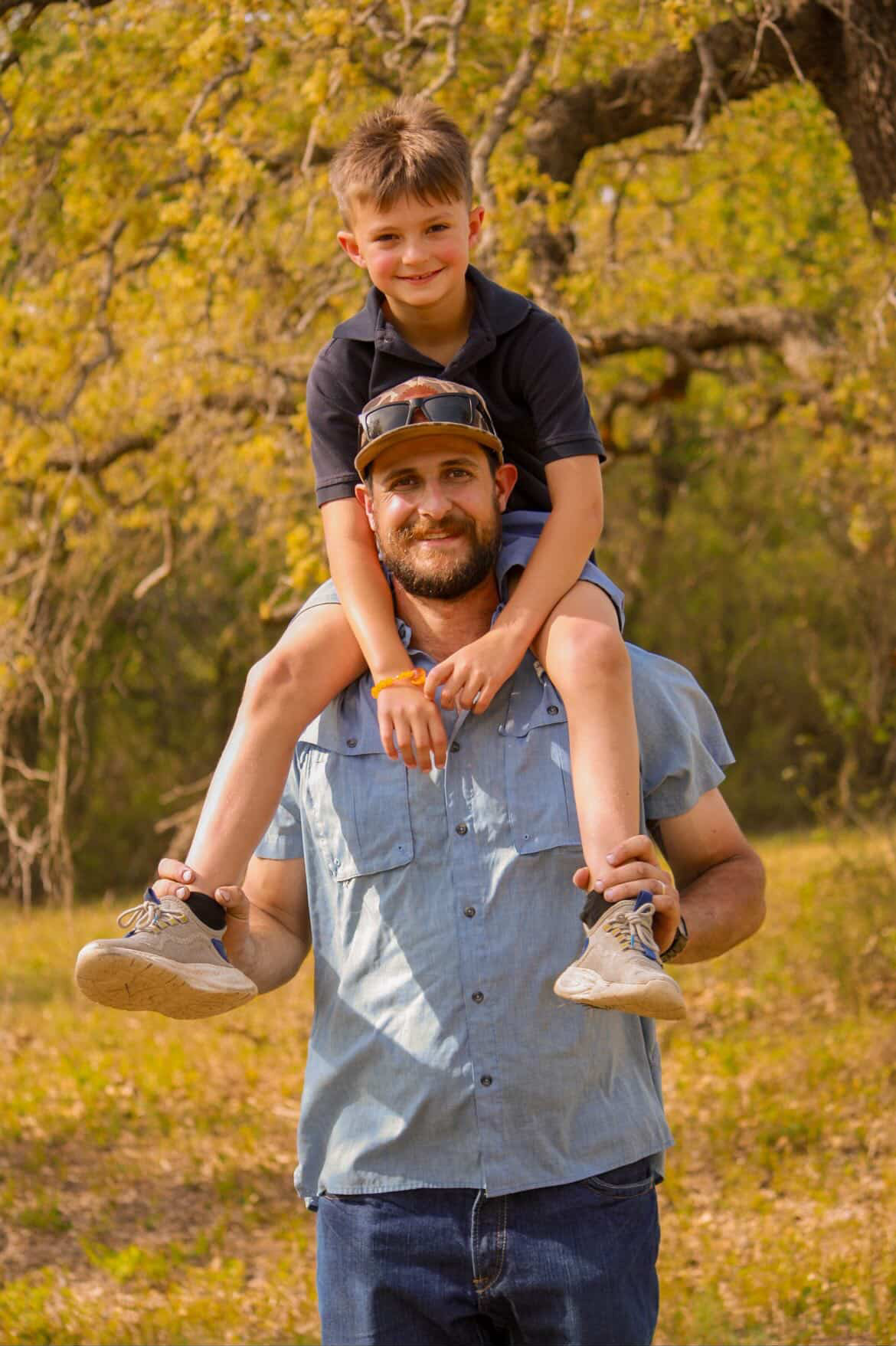 Family walking together in golden West Texas light